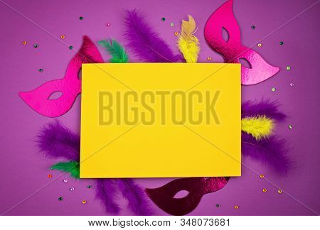 Festive, Colorful Mardi Gras Or Carnivale Mask And Accessories Over Purple Background. Party Invitat