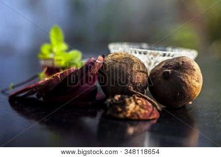 Beetroot Face Mask On The Black Glossy Surface Consisting Of Some Grated Beetroot Vegetable And Sour