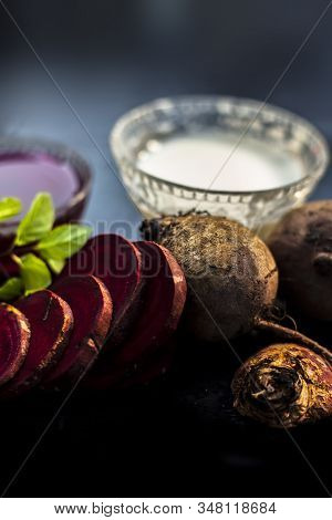 Beetroot Face Mask On The Black Glossy Surface Consisting Of Some Grated Beetroot Vegetable And Sour