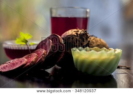 Close Up Of Fresh Beetroot Juice In A Glass Along With Some Multani Mitti Or Fuller's Earth In Glass