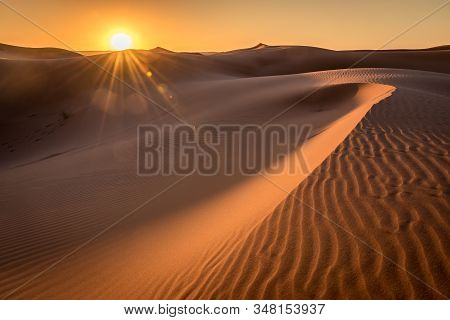 Golden Hour Sunrise Over The Sahara Dunes, Merzouga, Morocco
