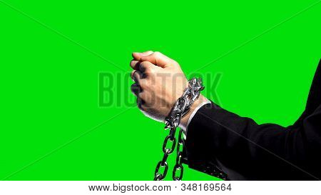 Business Sanctions, Chained Arms On Green Screen Background, Economic Conflict