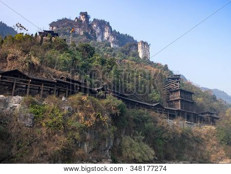 Yichang, Hubei / China - Dec 25 2019:  The Wooden Village Along With The Hill Beside The Yangtze Riv