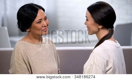 Mother Talking To Daughter, Tenderly Looking At Her, Giving Advice, Motherhood