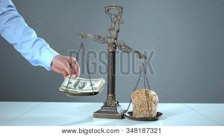 Bread With Dollars On Scales, Rising Prices Concept, Economical Instability