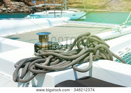 Rope Wound On The Small Windlass Of The Yacht Ship.