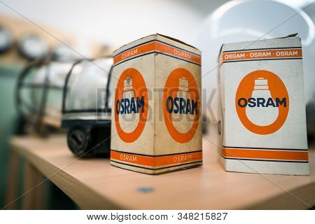 Augsburg, Germany - January 25, 2020: Two Old Osram Boxes On A Wooden Shelf
