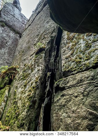 Megalithic rock structures with crevices within Szczeliniec sanstone ravine, Table Mountain National Park, Poland