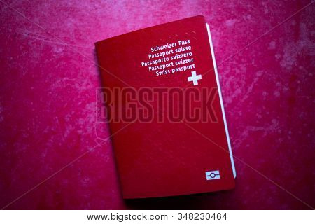  swiss passport on red background