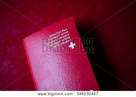  swiss passport on red background