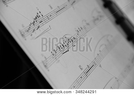 Brecht/belgium - February 6 2018: A Portrait Of A Music Sheet Partly Blurred And Partly Sharp Giving