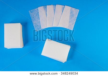 White Napkins Top View. A Set Of Cosmetic Tools For Manicure And Pedicure