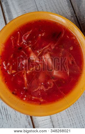 Traditional Ukrainian Russian Vegetable Borscht On The Old Wooden Background. Borscht. Borsch With Q