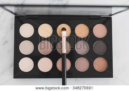 Beauty Industry And Make-up Products, Eyeshadow Palettes With Nudes And Bronzy Tones With Brushes