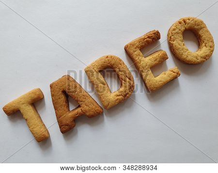 Baked Biscuits With Shape Of Letters Forming The Name Tadeo