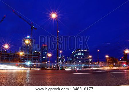 Warsaw,poland. 21 February 2017. Rondo Daszynskiego. Buildings At Night And  Roving Car With Blur Li