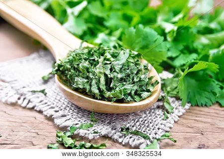 Cilantro Dried In Spoon On The Board