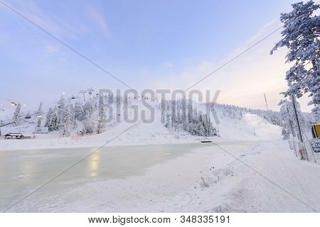 Rukatunturi Ski Jumping Hill In Winter Season And Nice Weather And Blue Sky In Winter Season And Sun