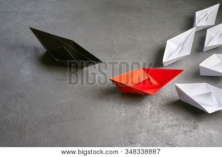 Opportunities Business Concept-paper Boat Key Opinion Leader, Influence Concept. One Black Paper Boa