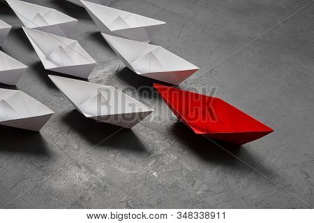 Business Leadership Concept, Paper Boat, The Key Opinion Leader, The Concept Of Influence. One Red P