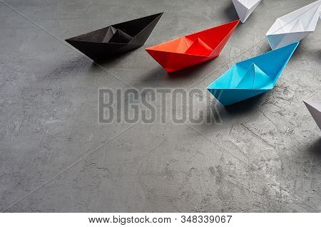 Business Concept, Paper Boat, The Key Opinion Leader, The Concept Of Influence.red,blue And Black Pa