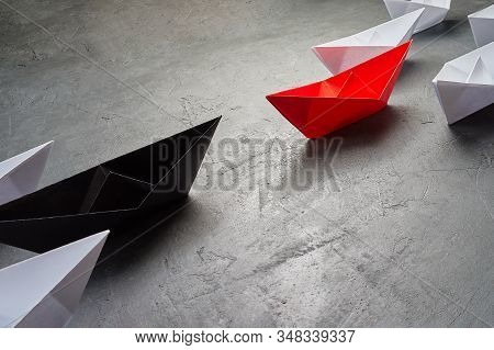 Opportunities Business Concept-paper Boat Key Opinion Leader, Influence Concept. One Black Paper Boa