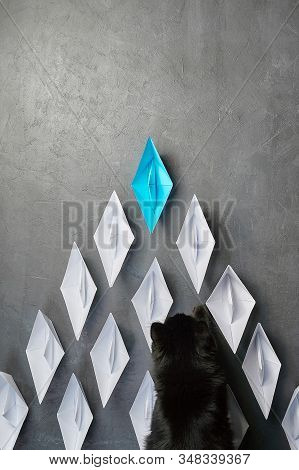 Business Concept, Paper Boat, Is The Leader Of Thought, The Concept Of Influence. One Blue Paper Boa