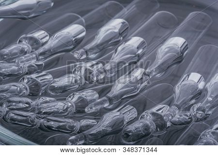 Glass Medical Ampoule Vial For Injection. Medicine Is Liquid Sodium Chloride With Of Aqueous Solutio