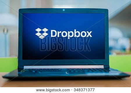 Poznan, Pol - Dec 11, 2019: Laptop Computer Displaying Logo Of Dropbox, A File Hosting Service Opera