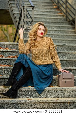 Taking Some Time To Rest. Casual Style Student. Fall Season. Girl Long Blond Hair Stairs. Girl In Sk