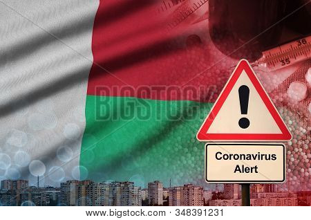 Madagascar Flag And Coronavirus 2019-ncov Alert Sign. Concept Of High Probability Of Novel Coronavir