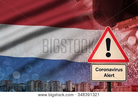 Netherlands Flag And Coronavirus 2019-ncov Alert Sign. Concept Of High Probability Of Novel Coronavi