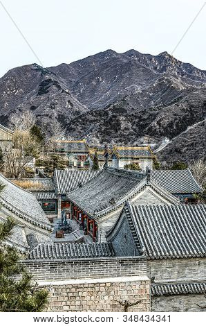Buildings Of A Fragment Of The Great Chinese Wall In The Mountains Near Bejing