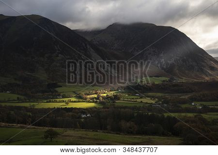 Stunning Autumn Fall Landscape View Along Valley Towards Mellbreak And Grasmoor In Lake District Wit