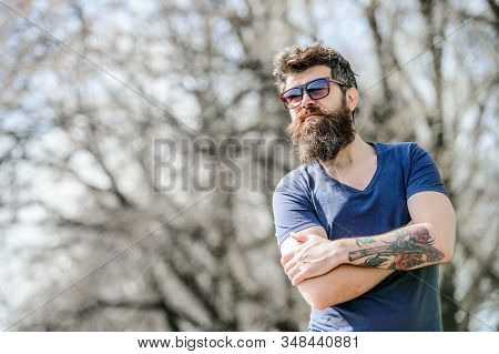 Bearded Man Wear Modern Fashionable Sunglasses. Uv Filter. Man Bearded With Sunglasses Nature Backgr