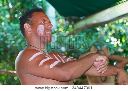 Kuranda, Australia - November 07, 2007: Aborigine Actor Performs Traditional Dance In The Tjapukai C