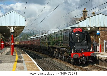 Penrith, England - July 28: Preserved Steam Locomotive 46233, Duchess Of Sutherland, Heads The Cumbr