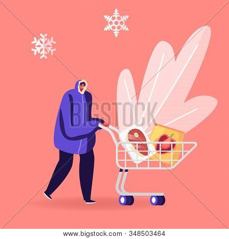 Young Smiling Man In Winter Clothing Pushing Shopping Cart With Frozen Food Packaging In Supermarket