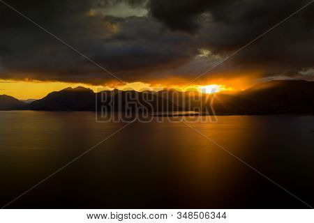 Drone Footage Of A Stormy Sunset Over Loch Linnhe, From North Ballachulish, Fort William, Scotland.