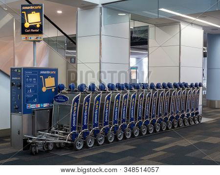 San Francisco, Ca July 17, 2018: Smart Carte Luggage Cart Dispenser At Baggage Pick Up Area At Airpo