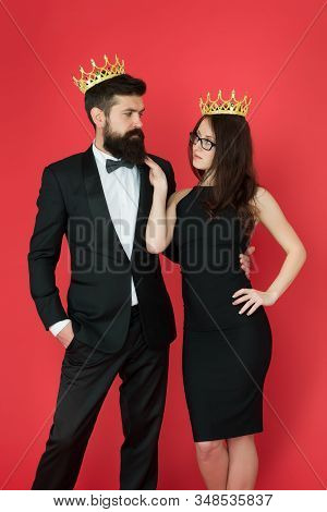Dont Go To Prom Alone. Prom King And Queen. Sensual Woman And Bearded Man Wear Prom Crowns. Coronati