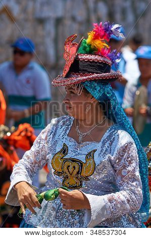 Arica, Chile - February 11, 2017: Members Of A Waca Waca Dance Group In Ornate Costume Performing At