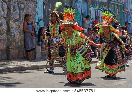 Arica, Chile - February 11, 2017: Tinkus Dance Group Dressed In Ornate Costumes Performing A Tinkus 