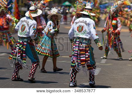 Arica, Chile - February 11, 2017: Tinkus Dance Group Dressed In Ornate Costumes Performing A Tinkus 