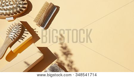 Bathroom, Spa Accessories Concept Flat Lay On The Beige Background. Top View Frame With Hairbrush , 