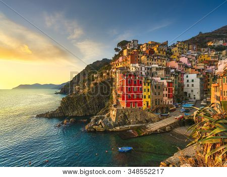 Riomaggiore Town, Cape And Sea Landscape At Sunset. Seascape In Cinque Terre National Park, Liguria 