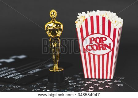 Xalapa, Veracruz, Mexico- January 31, 2020: Plastic Oscar Award, Clapboard, Classic Popcorn Box And 