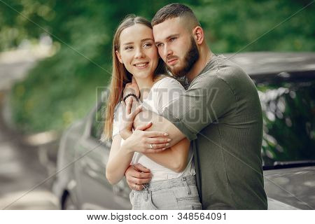 Beautiful Couple Spend Time On A Summer Forest