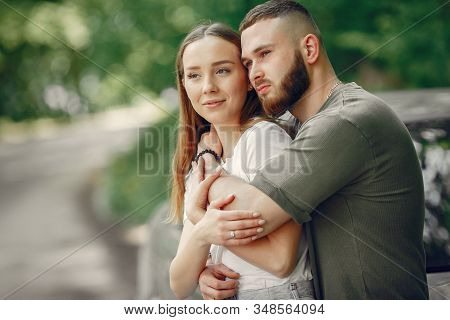 Beautiful Couple Spend Time On A Summer Forest