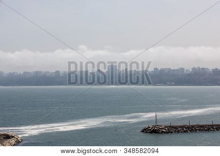 Chorillos, Lima, Peru - May 10, 2016: Looking From Chorillos To The City Of Lima Which Is Covered In